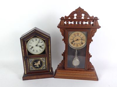 2 Wooden Mantle Clocks and Clock Oil. Includes 1 clock made by New Haven Clock Co (New Haven 