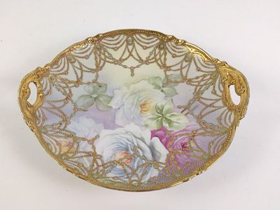 Gold Decorated Victorian Style Platter. Signed "O 62 KB" on the back. Good condition. 10" wide 