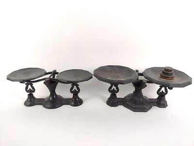 2 Cast Iron Scales with Weights. NOT ELIGIBLE FOR IN-HOUSE SHIPPING: See Terms for Shipping 