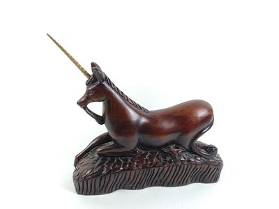 Carved Wooden Unicorn with Metal Horn. Sticker on bottom says it was made in Spain. Normal wear 