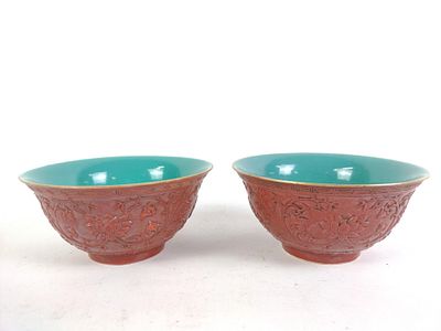Pair of Yongzheng Signed Red Ceramic Bowls. Floral design on exteriors. Each 6-1/4" diameter X 