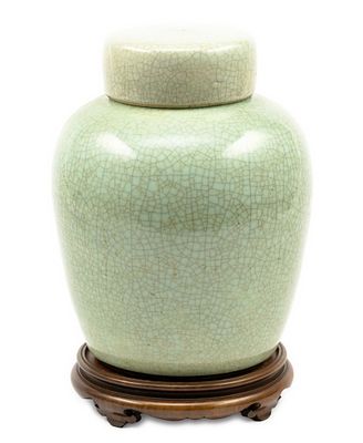 Celadon Ginger Jar. DESCRIPTION: Celadon glazed ginger jar. Crackle finish. With wood stand. 