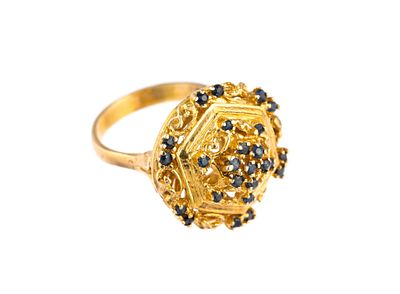 14K Gold and Sapphire Ring. Size 6 yellow gold ring with sapphire enhancements. The weight is 