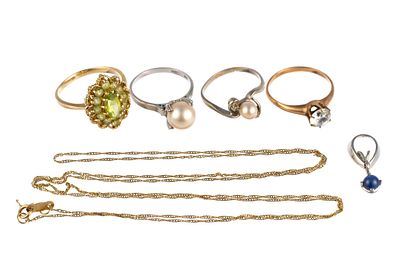 Six Pcs 14K Gold Jewelry. The rings vary from size 6 to size 9. The white gold pendant has a 