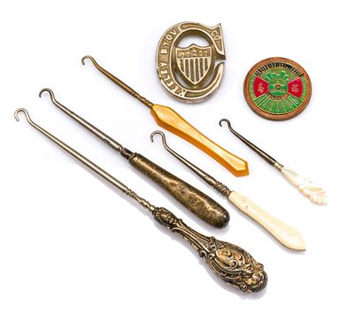 Seven Antique Items incl Button Hooks. Mother-of -pearl, bone and silver handled button hooks 