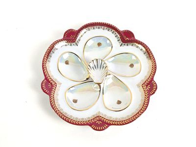 Antique Limoges Oyster Plate. Approx. 9-1/2" diameter. Mark on bottom. Overall excellent condition.