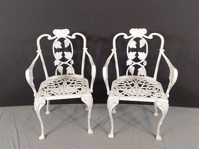 Pair Of Cast Iron Outdoor Chairs. NOT ELIGIBLE FOR IN-HOUSE SHIPPING: See Terms for Shipping 