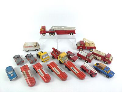 17 Toy Trucks & Cars. Includes Mobil. 4" to 11-1/2" long. Some paint loss and rust.