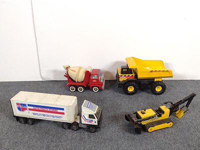 4 Toy Trucks incl. Tonka. 9-3/4" to 25-1/4" long.