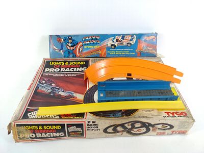 Captain America Stunt Set & Tyco Pro Racing. In original boxes. Wear to boxes.