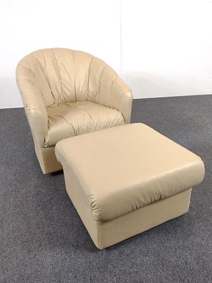 Arhaus Leather Swivel Armchair with Ottoman. NOT ELIGIBLE FOR IN-HOUSE SHIPPING: See Terms for 