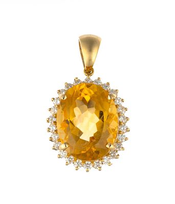 14K Gold 1.3 CTW Diamond and Citrine Pendant. An oval citrine gemstone 16 carats surrounded by 
