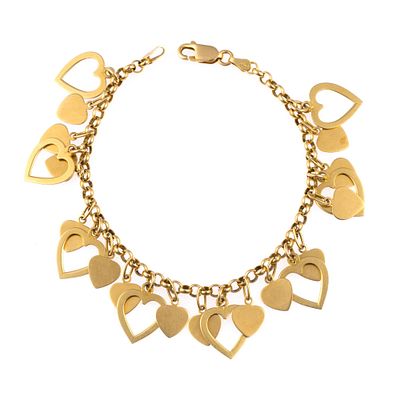 14K Gold Hearts Charm Bracelet. A 7" chain bracelet with heart charms. The weight is 14.0 grams.