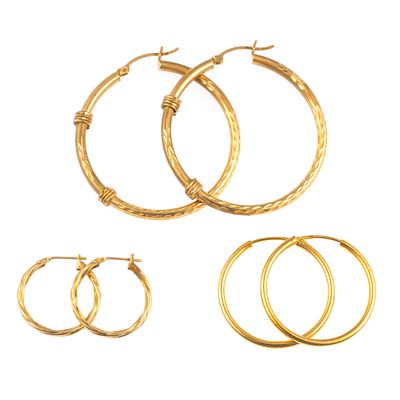 3 Prs 14K Gold Hoop Earrings. Yellow gold hoops in three different sizes, 3/4", 1", 1 1/2". 