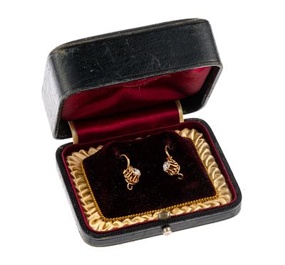 Antique 14K Gold and Diamond Earrings. Antique yellow gold earrings each with approximately 1/4 