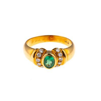 H. Stern 18K Gold, Diamond, and Emerald Ring. A size 7.25 ring with 0.50 carat emerald and 0.20 