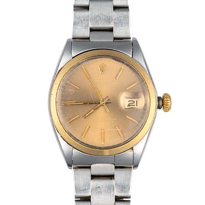 14K Gold and Stainless Steel Rolex Date Oyster Perpetual. A Rolex Date Oyster Perpetual model 