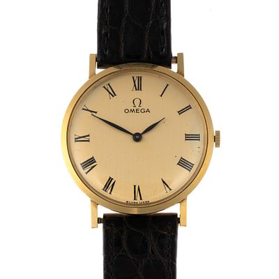 14K Gold Omega Dress Watch. A 1974 Omega Model D6672 dress watch 32 mm diameter case size not 