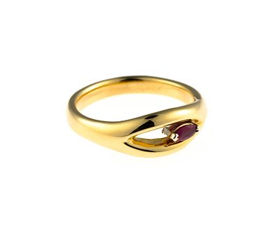 18K Gold and Ruby Ring. A size 6 yellow gold ring enhanced by a marquise cut ruby of 0.18 