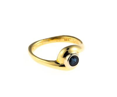 18K Gold and Sapphire Ring. A size 6 yellow gold ring enhanced by a round blue sapphire. This is 