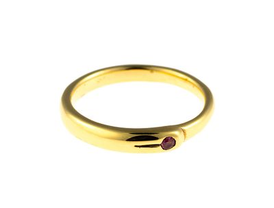 18K Gold and Ruby Ring. A size 6.25 yellow gold ring enhanced by a ruby. This is an unused 