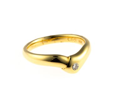 18K Gold and Diamond Ring. A size 6 yellow gold ring enhanced by a .07 carat round brilliant cut 