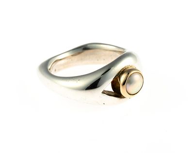 Sterling Silver, 14K Gold, and Pearl Ring. A size 6 sterling silver ring enhanced by a pearl set 