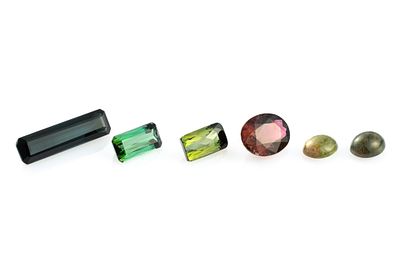 Six Tourmaline Gemstones. Unmounted tourmaline includes 4.6 carat neon green, octagon, Africa. 