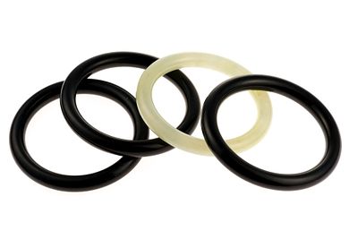 Four Onyx and Jade Bangles. Each bangle is 2 1/2" inner diameter.