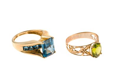 Two 10K Gold Gemstone Rings. Two yellow gold rings marked 10k, one size 7 with peridot and one 