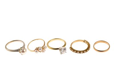 5 14K Gold Rings Incl. Diamond and Pearl. Soltaire is CZ. Diamond band with twelve .05 ct round 