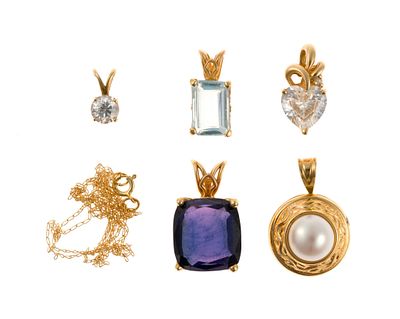 Five 14K Gold Gemstone Pendants. A group of five gemstone pendants in yellow gold, all marked 
