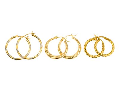 Three Pairs 14K Gold Hoop Earrings. Yellow gold hoop earrings for pierced ears ranging 3/4" to 