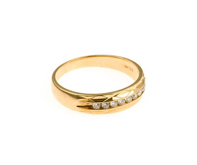 14K Gold and Diamond Band Ring. A size 10 ring with eight channel-set round diamonds. The ring 