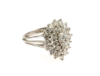 14K Gold and 2 CTW Diamond Ring. A size 7.5 white gold cocktail ring with 31 diamonds totaling 2 