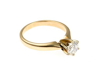 14K Gold and .72 Ct Diamond Ring. A size 6.5 yellow gold diamond solitaire ring with 0.72 carat 