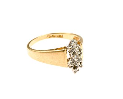 14K Gold and Diamond Ring. A size 6.5 yellow gold ring with small diamond enhancements. The ring 