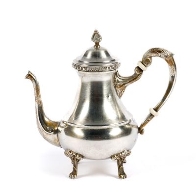 Egyptian Coin Silver Teapot. An 8 1/2" height teapot in 900 fine silver. The teapot bears the 