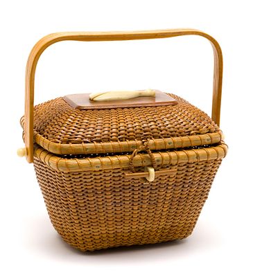 Nantucket Basket with Whale. Circa early to mid-20th century. Features a carved whale plaque on 
