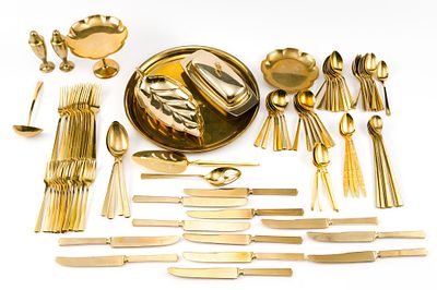 Dirilyte Brass Table Service Flatware. A set of (97) pieces, most of which are Dirilyte. 