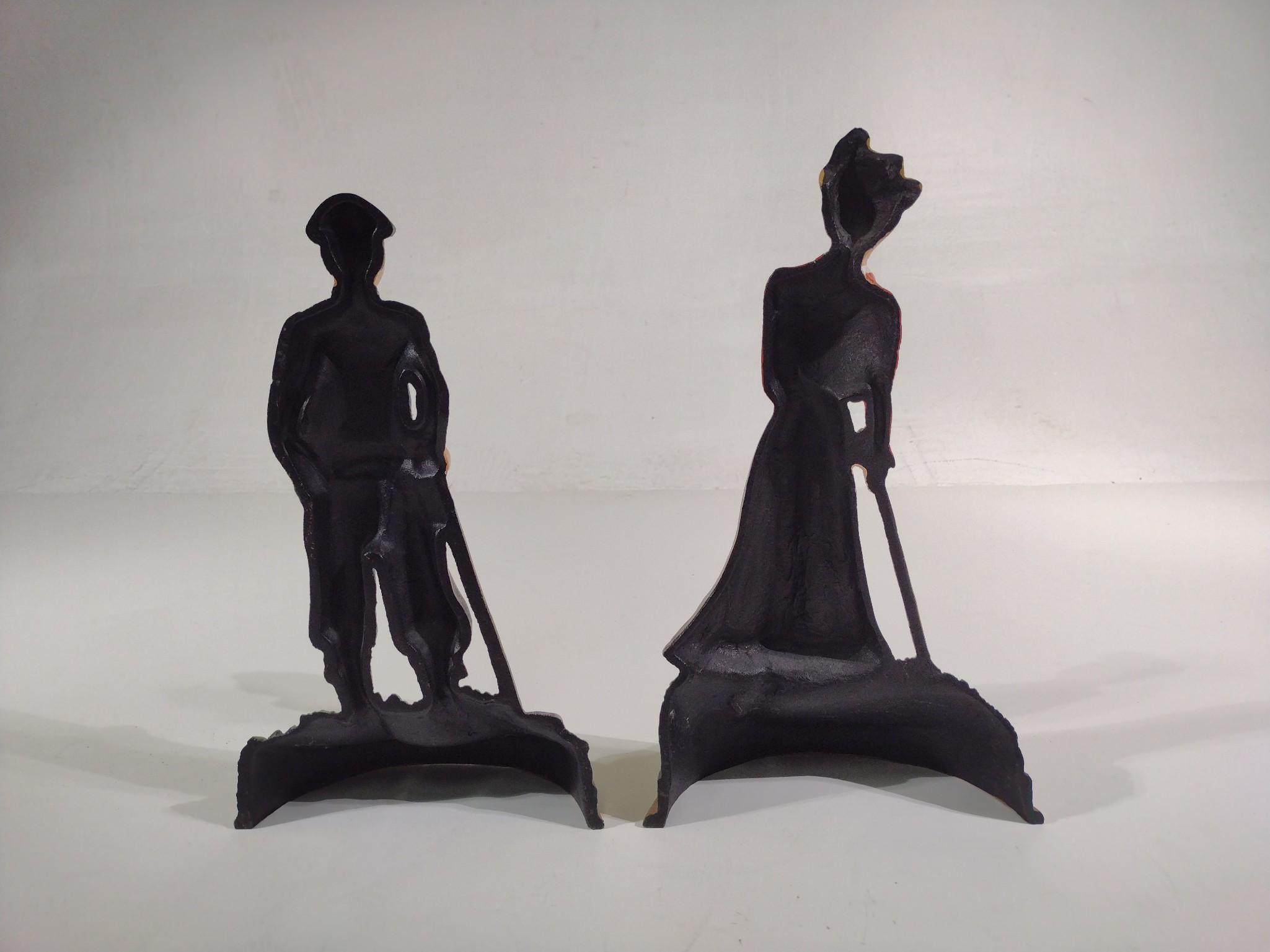 Pair of Cast Iron Golfer Doorstops