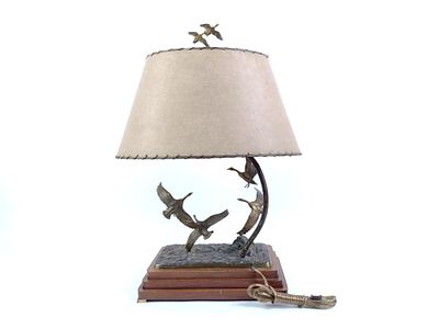 John F. Hansen Signed Table Lamp. Signed on base "John F. Hansen." This tall light has a tiered 