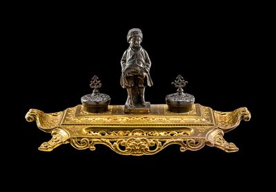 Maitland-Smith Brass Double Inkwell Desk Set. Central bronze sculpture of a young boy standing 
