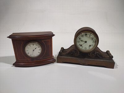 2 Mantle Clocks. One with label for Dutch Hill Clock Shop. 10-1/4" to 13" wide x 7" to 8-1/2" high.