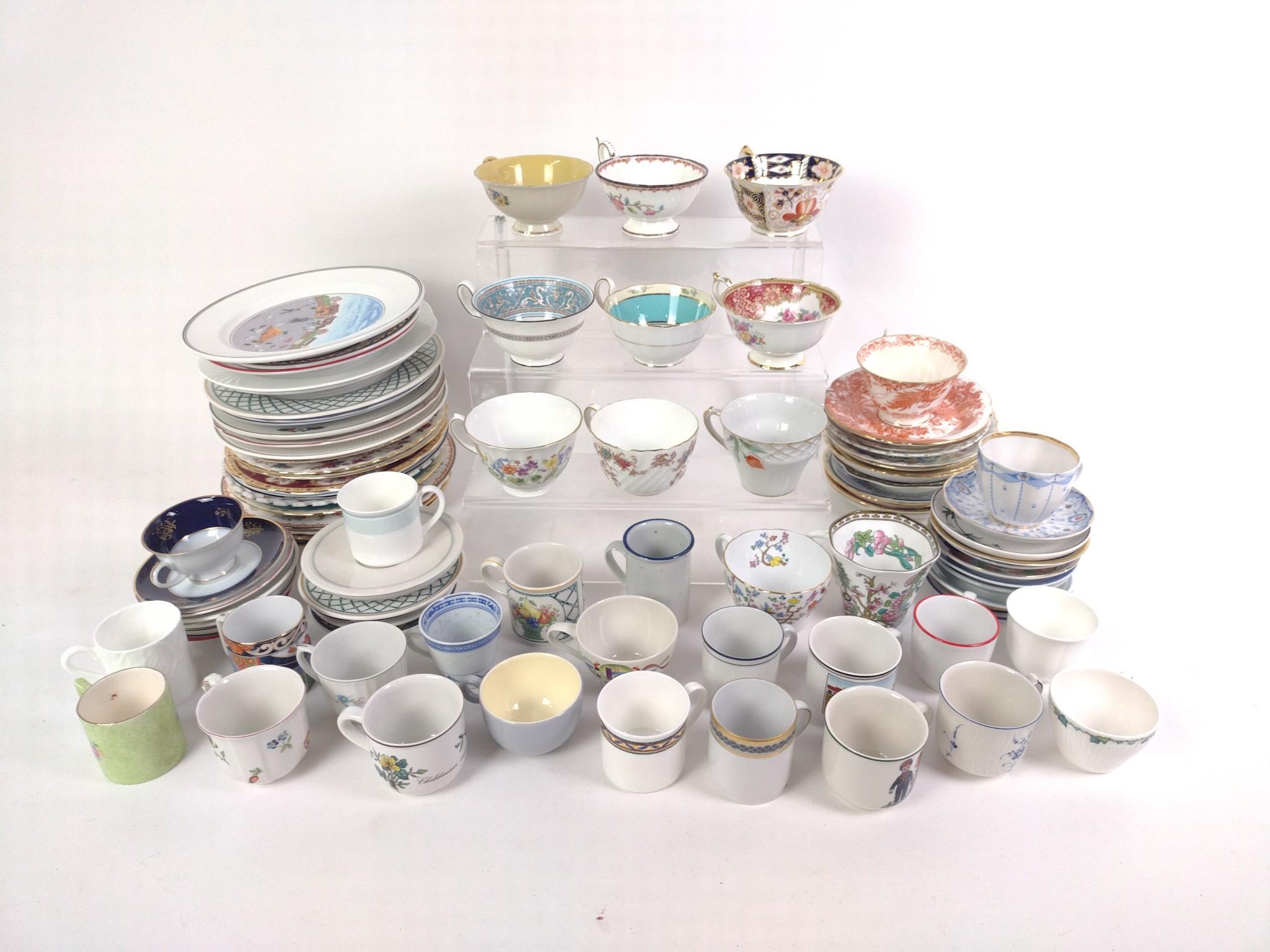 90 Teacups, Saucers, and Bread Plates