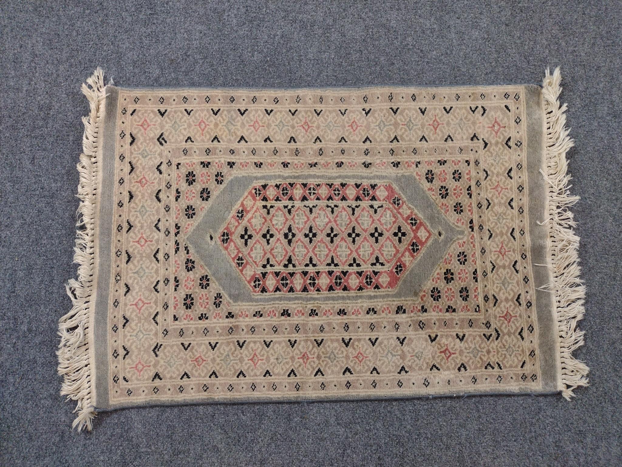 2 Throw Rugs