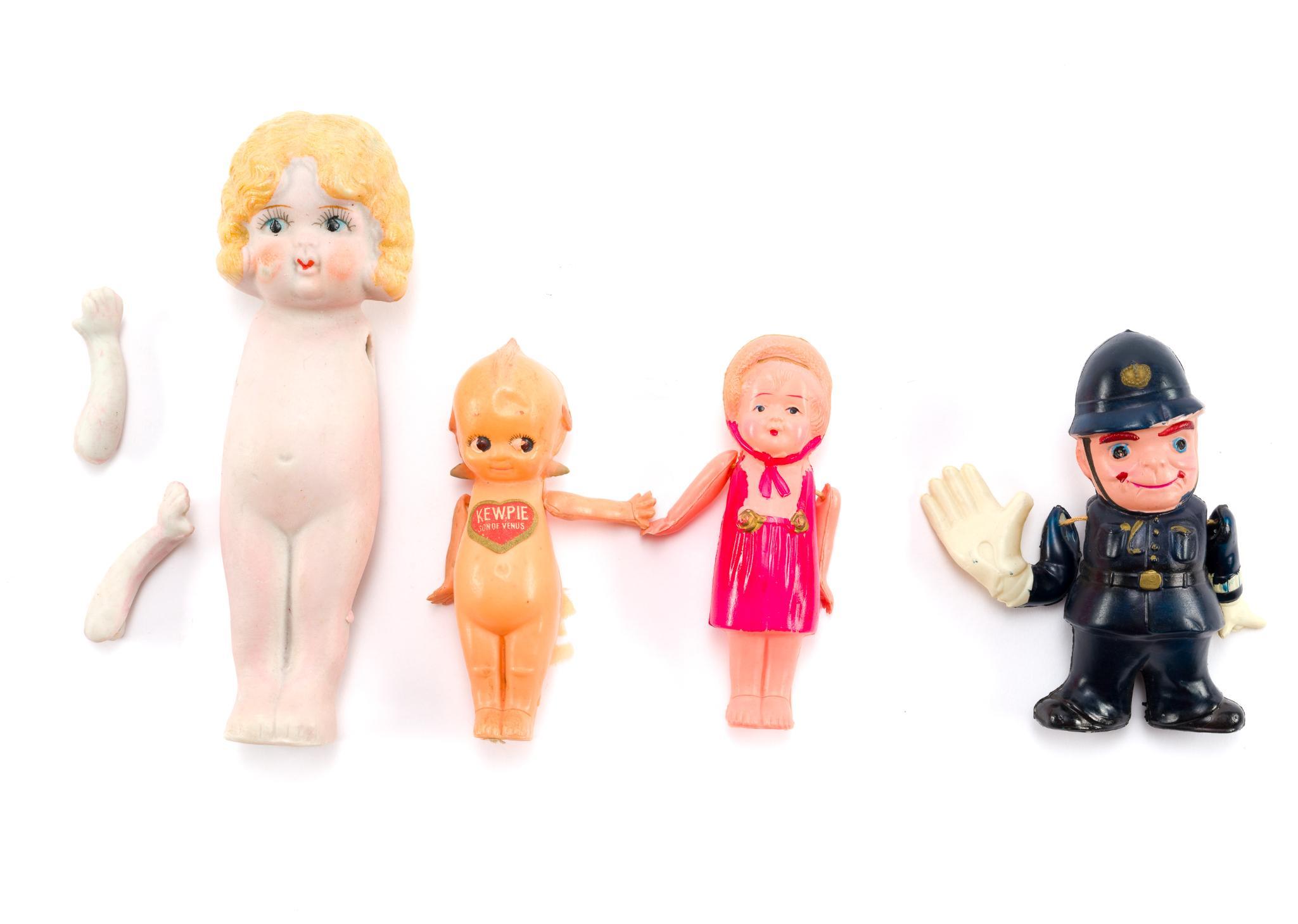 4 Kewpie Dolls