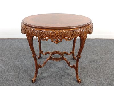 Carved and Inlaid Parlor Table. 32-1/2" wide X 25" deep X 29-1/2" high. Top has a few scratches. 