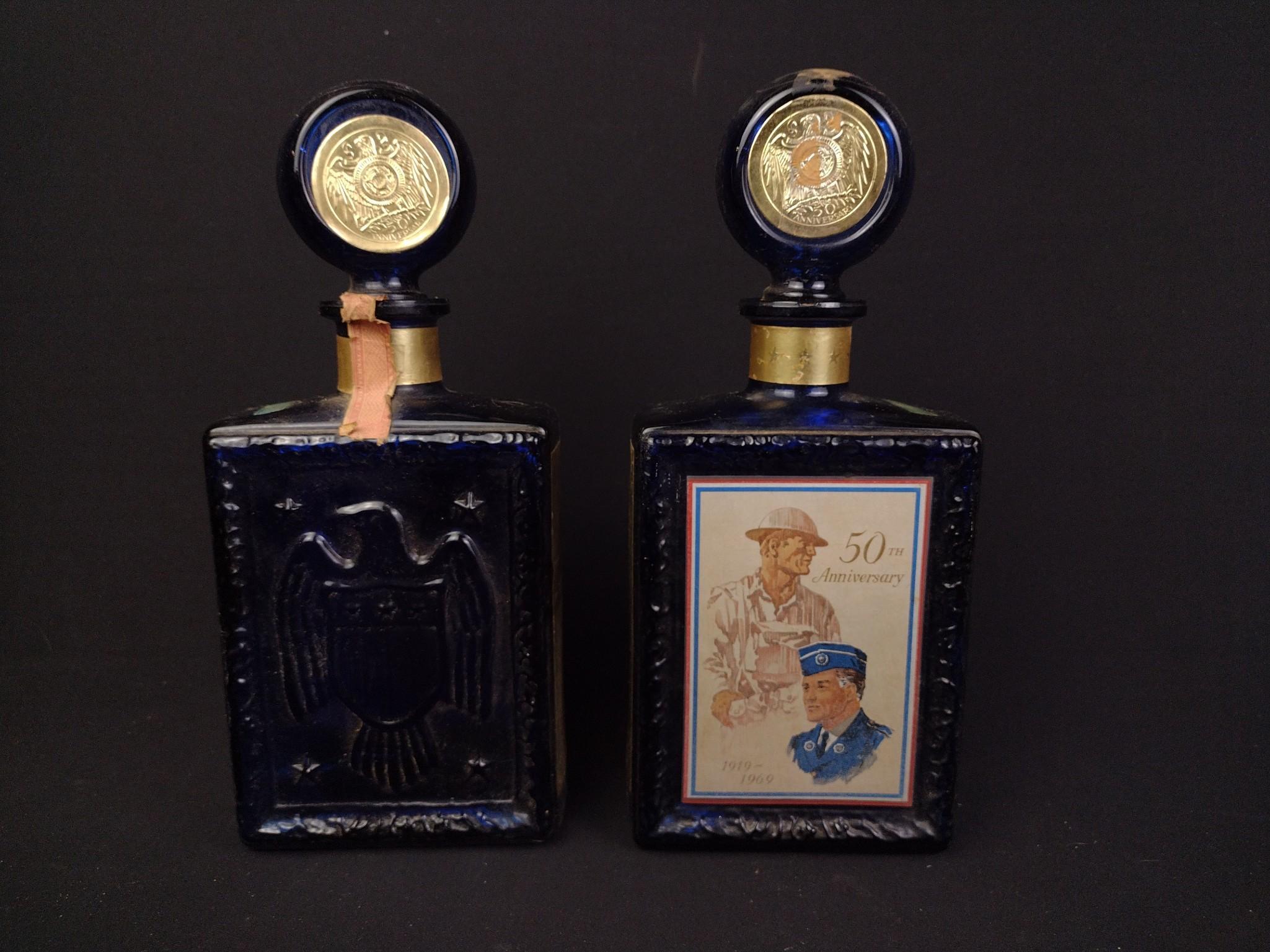 7 Whiskey Decanters Incl. Beefeater & Ezra Brooks