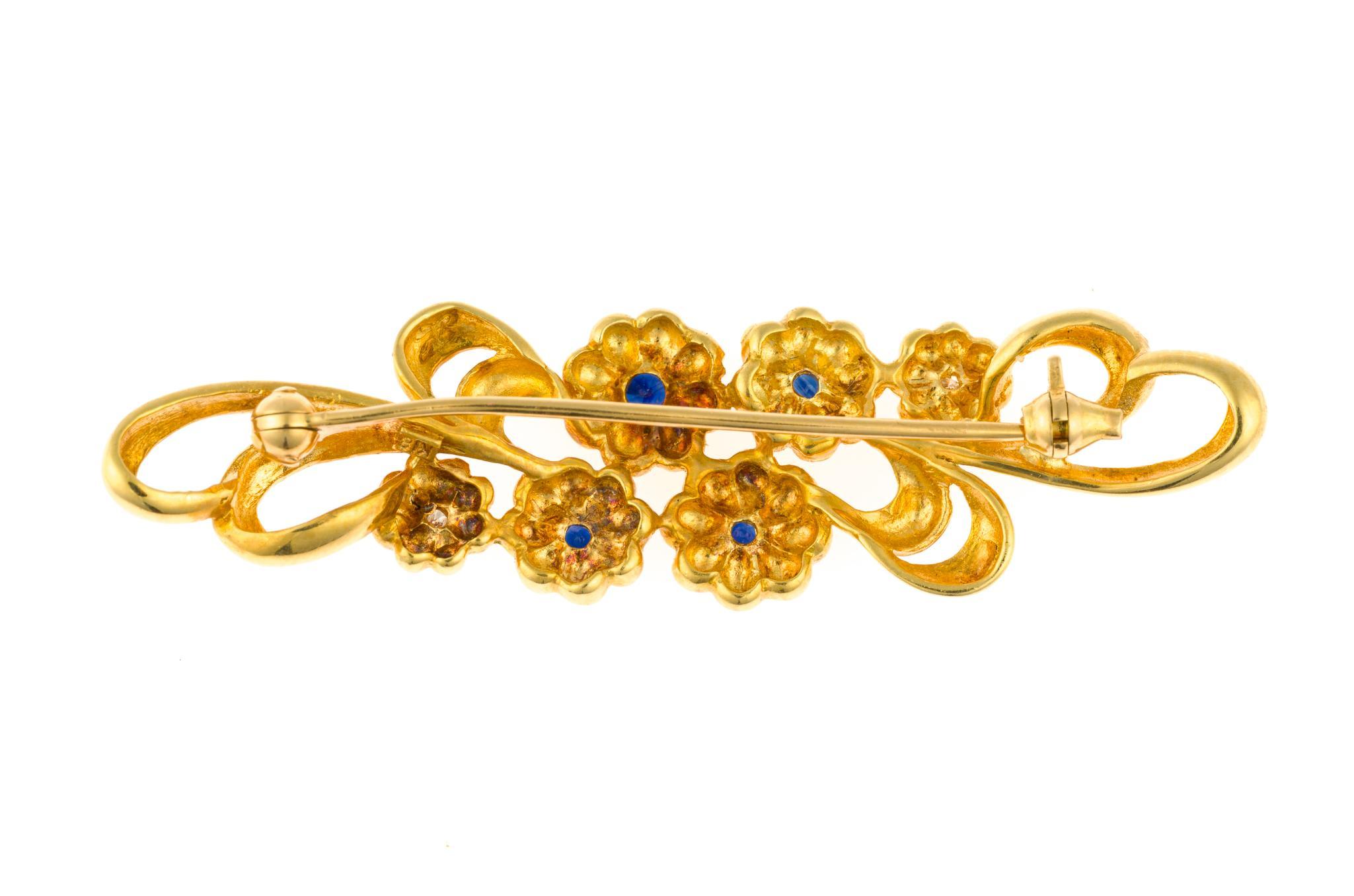 Two 18K Gold Brooches